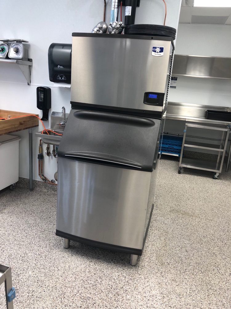 A Manitowoc commercial ice machine installed and serviced by Temperature Select Air.